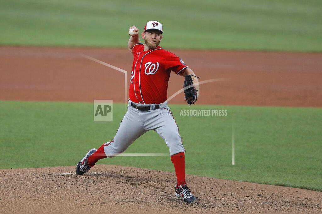 Julio Cortez Washington Nationals starting pitcher Stephen Strasburg delivers a pitch to the Baltimore Orioles during an exhibition baseball game, Monday, July 20, 2020, in Baltimore. (AP Photo/Julio Cortez)