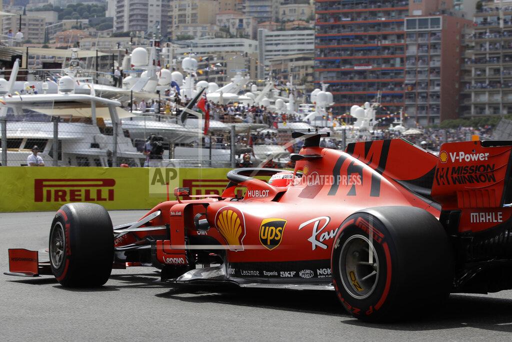 Luca Bruno Ferrari driver Sebastian Vettel of Germany steers his car during the qualifying session at the Monaco racetrack, in Monaco, Saturday, May 25, 2019. The Formula one race will be held on Sunday. (AP Photo/Luca Bruno)