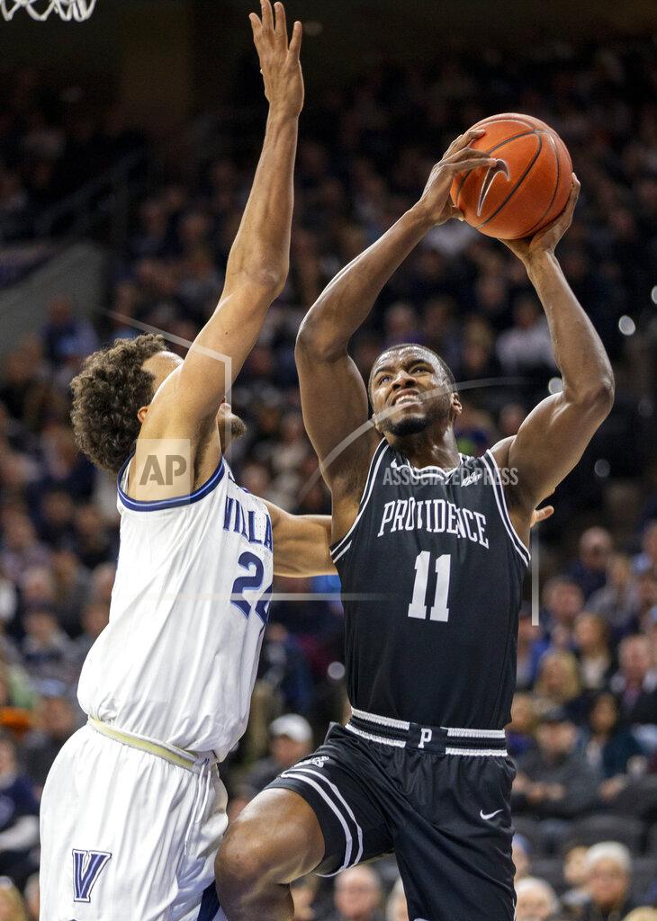 Laurence Kesterson Providence guard Alpha Diallo (11) takes a shot over Villanova forward Jeremiah Robinson-Earl (24) during the second half of an NCAA college basketball game, Saturday, Feb. 29, 2020, in Philadelphia, Pa. Providence won 58-54. (AP Photo/Laurence Kesterson)