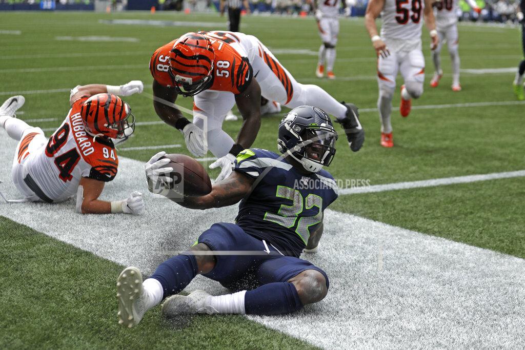 Stephen Brashear Seattle Seahawks running back Chris Carson (32) scores a touchdown against the Cincinnati Bengals during the first half of an NFL football game, Sunday, Sept. 8, 2019, in Seattle. (AP Photo/Stephen Brashear)