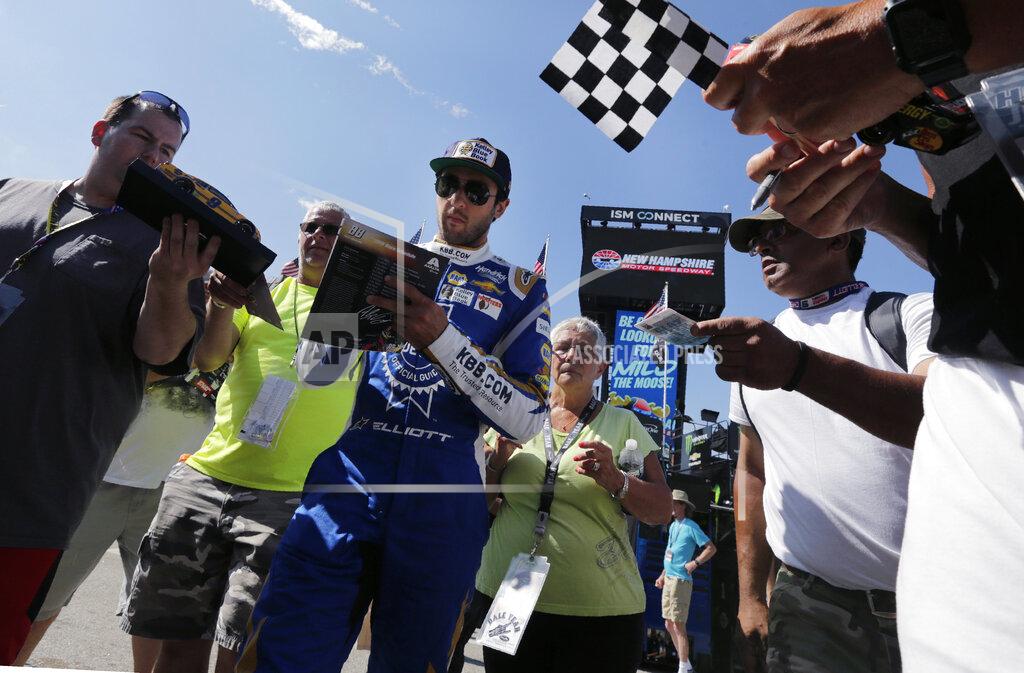 Charles Krupa Chase Elliott signs autographs for fans as he heads to his garage during a NASCAR Cup Series auto race practice at New Hampshire Motor Speedway in Loudon, N.H., Saturday, July 20, 2019. (AP Photo/Charles Krupa)