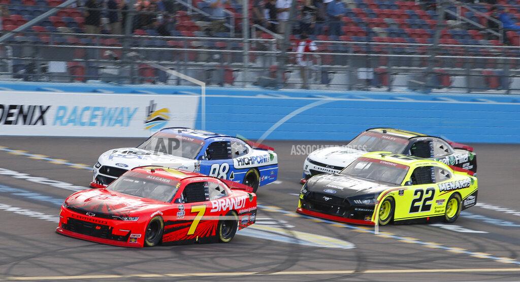 Ralph Freso Justin Allgaier (7) leads Chase Briscoe (98), Austin Cindric (22) and Justin Haley (11) through Turn 4 during a NASCAR Xfinity Series auto race at Phoenix Raceway, Saturday, Nov. 7, 2020, in Avondale, Ariz. (AP Photo/Ralph Freso)