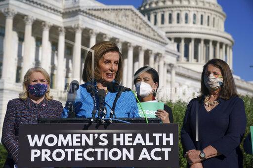 House Speaker Nancy Pelosi, D-Calif., joined from left by Rep. Sylvia Garcia, D-Texas, Rep. Judy Chu, D-Calif., and Rep. Diana DeGette, D-Colo., holds a news conference just before a House vote on legislation aimed at guaranteeing a woman’s right to an abortion, an effort by House Democrats to circumvent a new Texas law that has placed that access under threat, at the Capitol in Washington, Friday, Sept. 24, 2021. (AP Photo/J. Scott Applewhite)