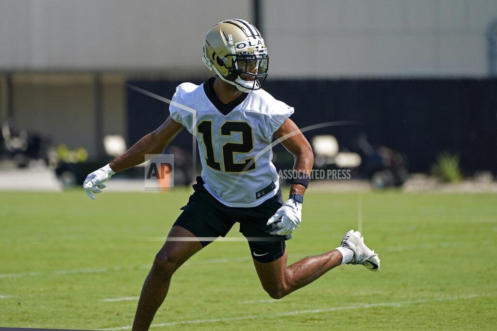 Gerald Herbert New Orleans Saints wide receiver Chris Olave (12) works out during the NFL football team's rookie minicamp in Metairie, La., Saturday, May 14, 2022. (AP Photo/Gerald Herbert)
