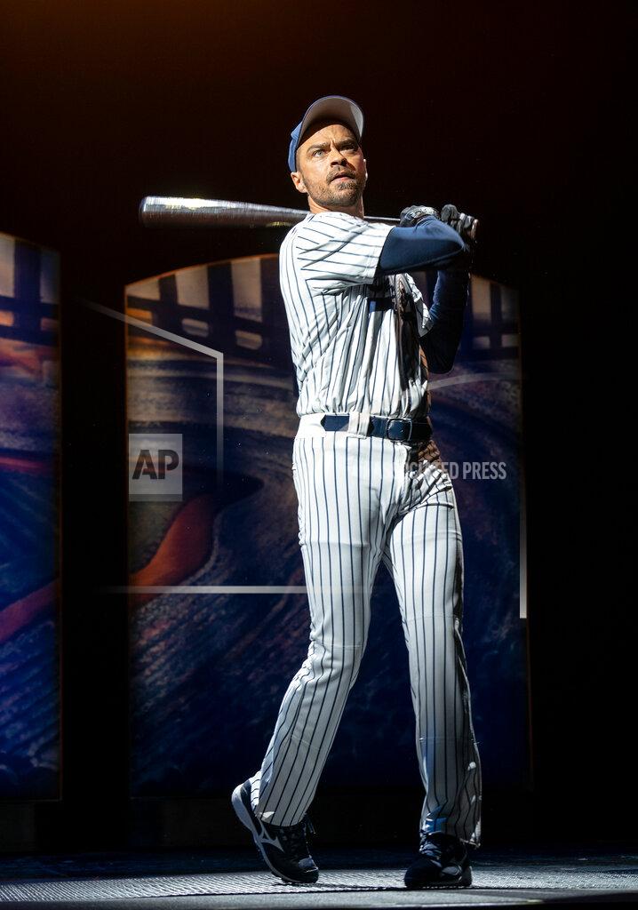 Joan Marcus This image released by Polk & Co. shows Jesse Williams during a performance of the Broadway revival of the baseball-themed "Take Me Out," in New York. (Joan Marcus/Polk & Co., via AP)