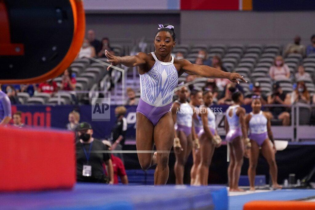 Tony Gutierrez Simone Biles takes a practice run on the vault before the U.S. Gymnastics Championships, Friday, June 4, 2021, in Fort Worth, Texas. (AP Photo/Tony Gutierrez)