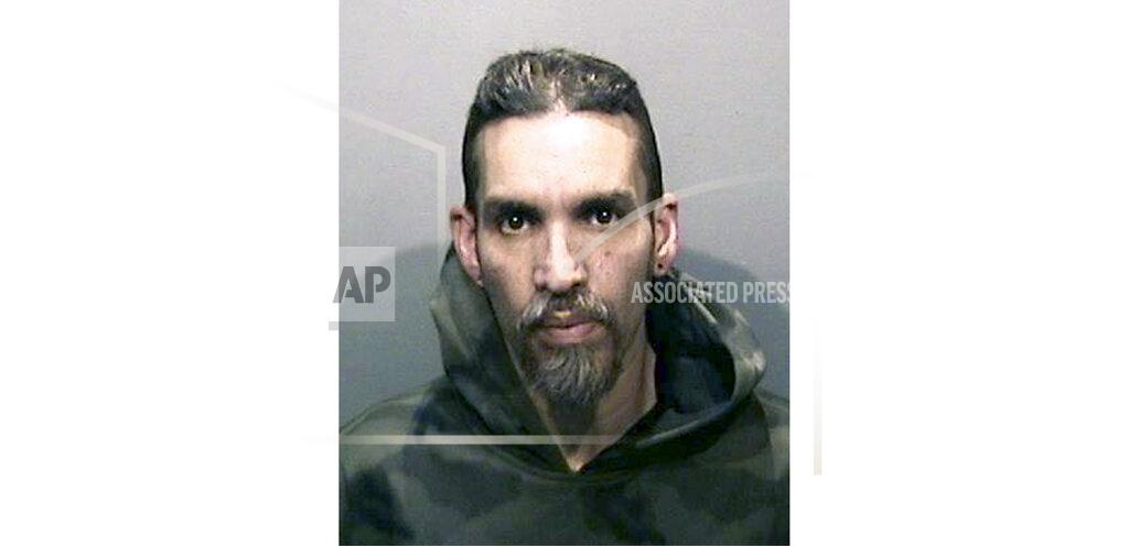FILE - In this June 5, 2017, file photo, released by the Alameda County Sheriff's Office shows Derick Almena at Santa Rita Jail in Alameda County, Calif. Family members of the 36 people killed when a fire broke out at a San Francisco warehouse during a music event urged a judge Monday, March 8, 2021, to impose the toughest sentence for Derick Almena, the master tenant of the building, or reject a plea deal he struck with prosecutors to avoid a second trial. (Alameda County Sheriff's Office via AP, File)