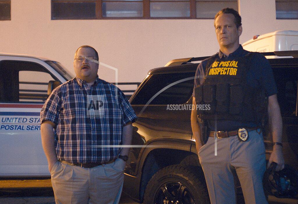 Uncredited This image released by STX Films shows Paul Walter Hauser, left, and Vince Vaughn in a scene from "Queenpins." (STX Films via AP)