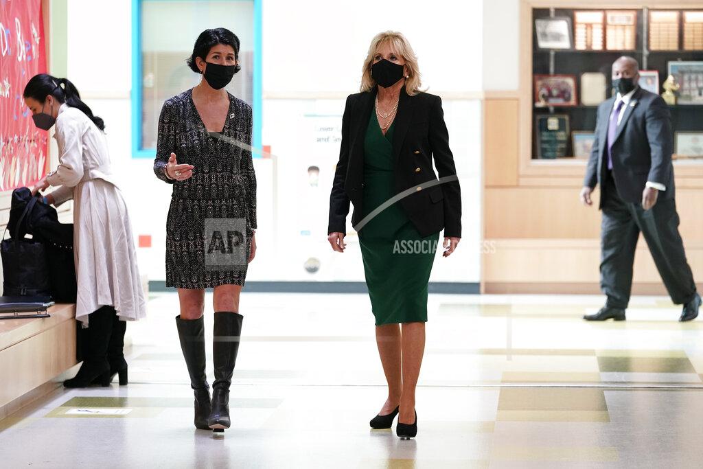 Susan Walsh First lady Jill Biden tours the Christa McAuliffe School with principal Kris Gallo in Concord, N.H., Wednesday, March 17, 2021. (AP Photo/Susan Walsh, Pool)