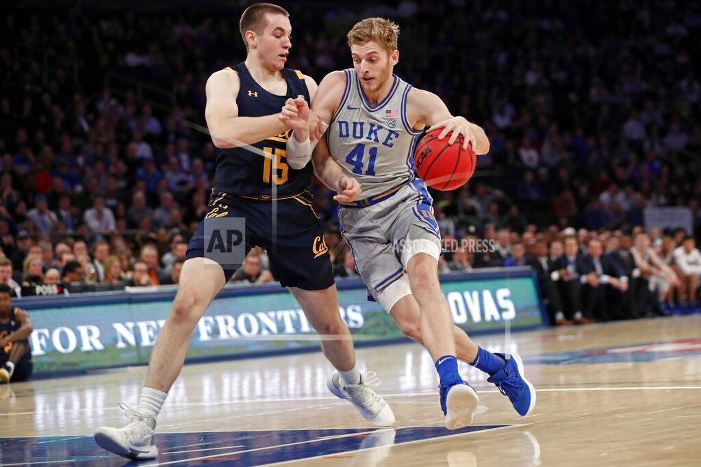 Kathy Willens Duke forward Jack White (41) drives around California forward Grant Anticevich (15) during the first half of the first round of the 2K Empire Classic NCAA college basketball tournament, Thursday, Nov. 21, 2019, in New York. (AP Photo/Kathy Willens)