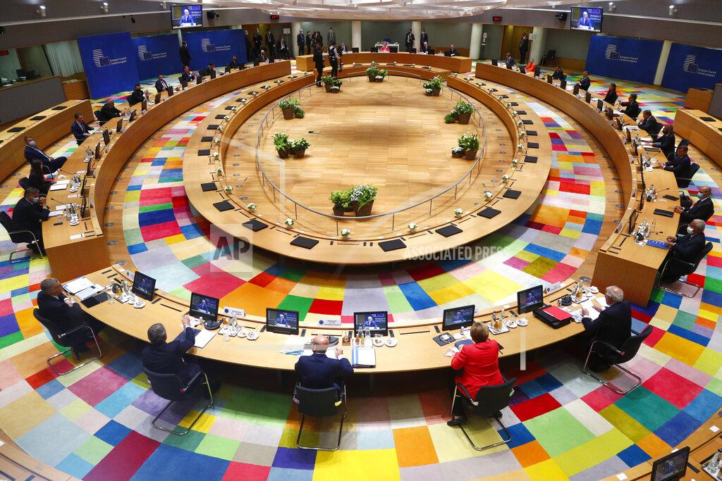 Francois Lenoir European Union leaders during a round table meeting at an EU summit in Brussels, Friday, July 17, 2020. Leaders from 27 European Union nations meet face-to-face on Friday for the first time since February, despite the dangers of the coronavirus pandemic, to assess an overall budget and recovery package spread over seven years estimated at some 1.75 trillion to 1.85 trillion euros. (Francois Lenoir, Pool Photo via AP)