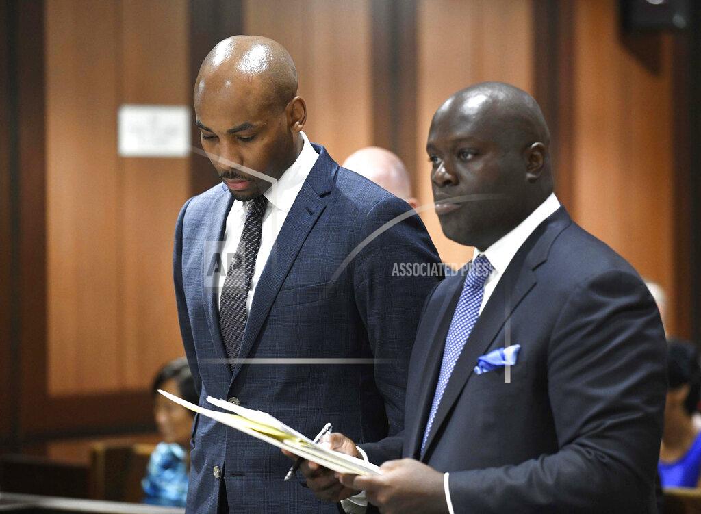Barry Williams FILE - In this Aug. 9, 2018 file photo, Jamill Jones, left, appears in Queens Criminal Court in New York. The former Wake Forest University assistant basketball coach has been found guilty on Friday, Feb. 7, 2020 by a jury of misdemeanor assault for the punch that killed 35-year-old Sandor Szabo in August 2018. (Barry Williams/Dailymail.com via AP, Pool, File)