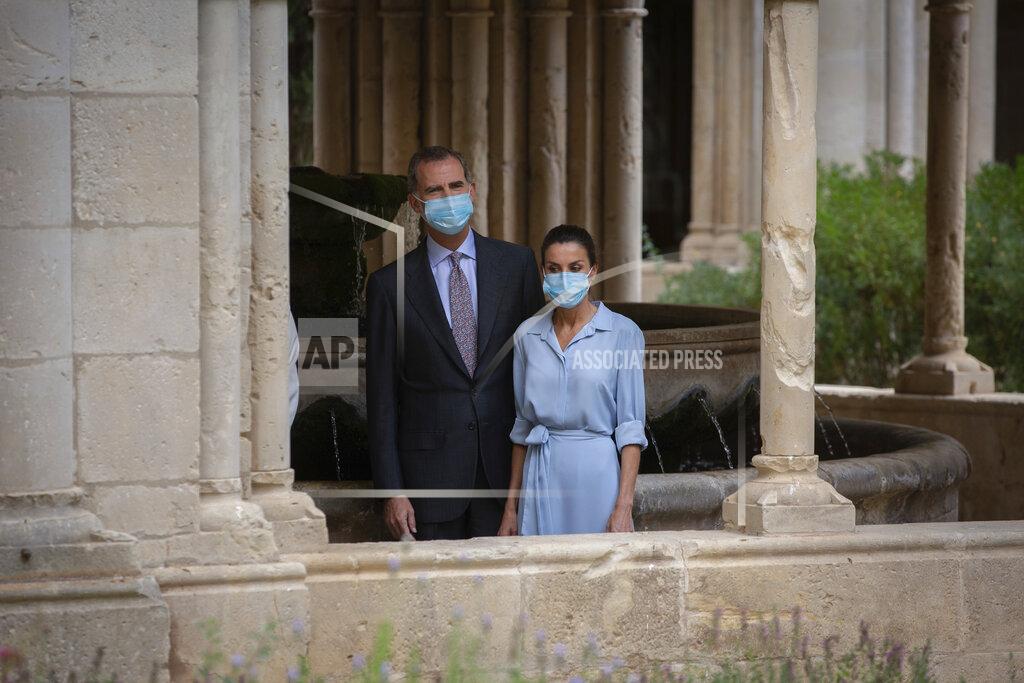 David Zorrakino Spain's King Felipe VI and Queen Letizia visit the Royal Monastery of Poblet, northeastern Spain, Monday, July 20, 2020. Hundreds of Catalan independence supporters are protesting Monday the visit of King Felipe VI and Queen Letizia to the northeastern region as part of a royal tour across Spain that is meant to bolster spirits amid the coronavirus pandemic. The visit comes as a barrage of media leaks have revealed how the king's father, former monarch Juan Carlos I, allegedly hid millions of untaxed euros in offshore funds. (David Zorrakino/Europa Press via AP)
