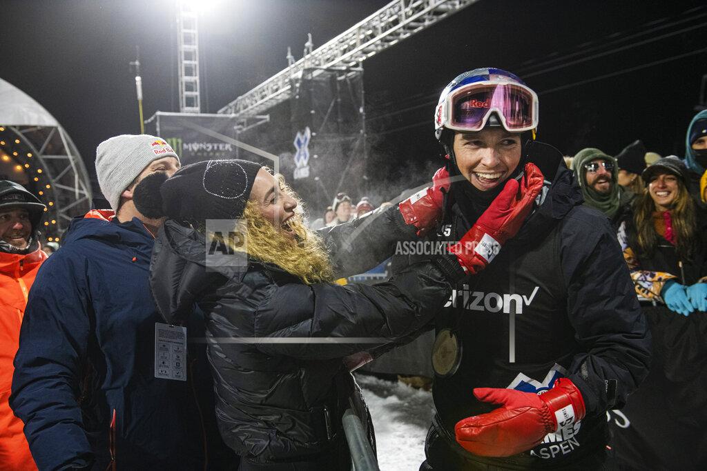 Kelsey Brunner Scotty James celebrates with his fiancé Chloe Stroll after winning a gold medal in men's snowboard superpipe at the 2022 Winter X Games in Aspen on Friday, Jan. 21, 2022. (Kelsey Brunner/The Aspen Times via AP)