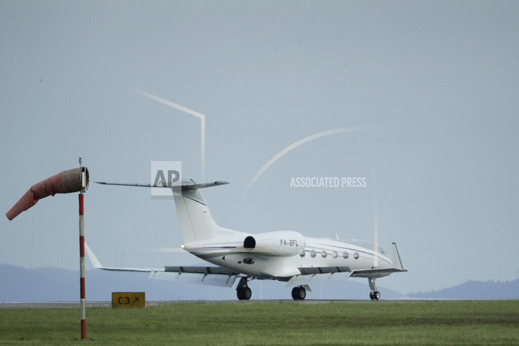 Lalo R. Villar A private jet with Spain's former King Juan Carlos on board taxis after landing at the Peinador airport in Vigo, north western Spain, Thursday, May 19, 2022. Spain's former King has returned to Spain Thursday for his first visit since leaving nearly two years ago amid a cloud of financial scandals. (AP Photo/Lalo R. Villar)