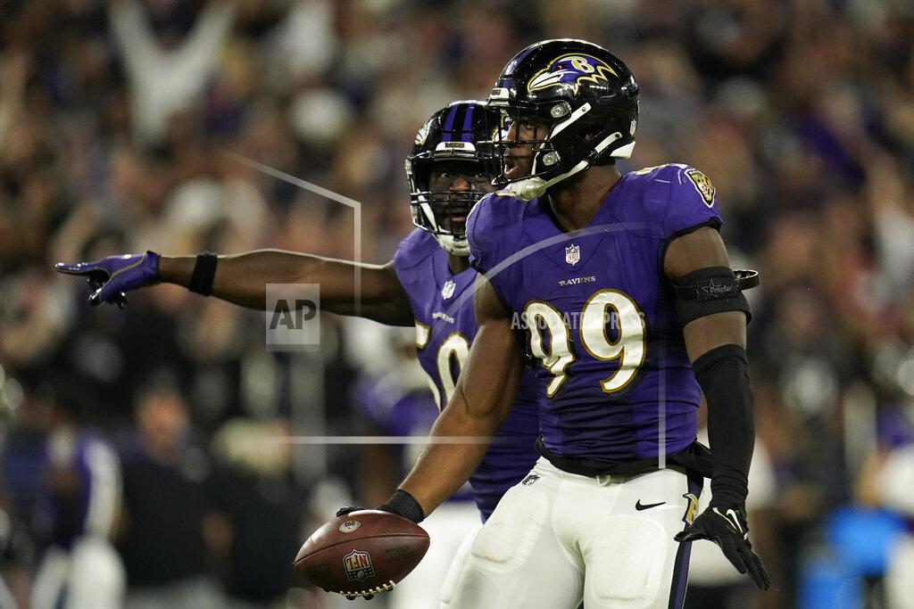 Julio Cortez Baltimore Ravens linebacker Odafe Oweh celebrates after recovering a Kansas City Chiefs fumble in the second half of an NFL football game, Sunday, Sept. 19, 2021, in Baltimore. Baltimore won 36-35. (AP Photo/Julio Cortez)
