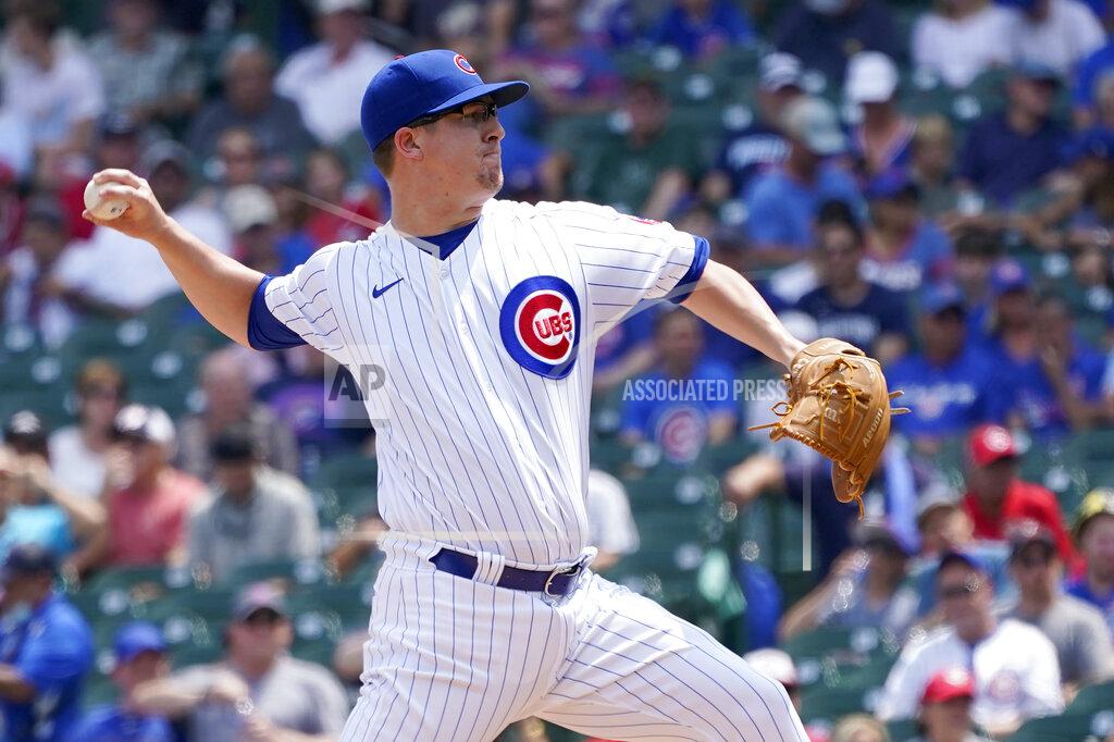 Charles Rex Arbogast Chicago Cubs starting pitcher Alec Mills delivers during the first inning of a baseball game against the Cincinnati Reds Thursday, July 29, 2021, in Chicago. (AP Photo/Charles Rex Arbogast)