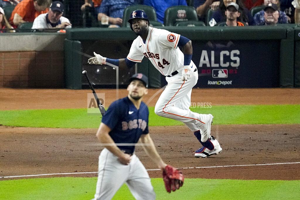 Sue Ogrocki Houston Astros' Yordan Alvarez watches his RBI-double off Boston Red Sox starting pitcher Nathan Eovaldi during the first inning in Game 6 of baseball's American League Championship Series Friday, Oct. 22, 2021, in Houston. (AP Photo/Sue Ogrocki)