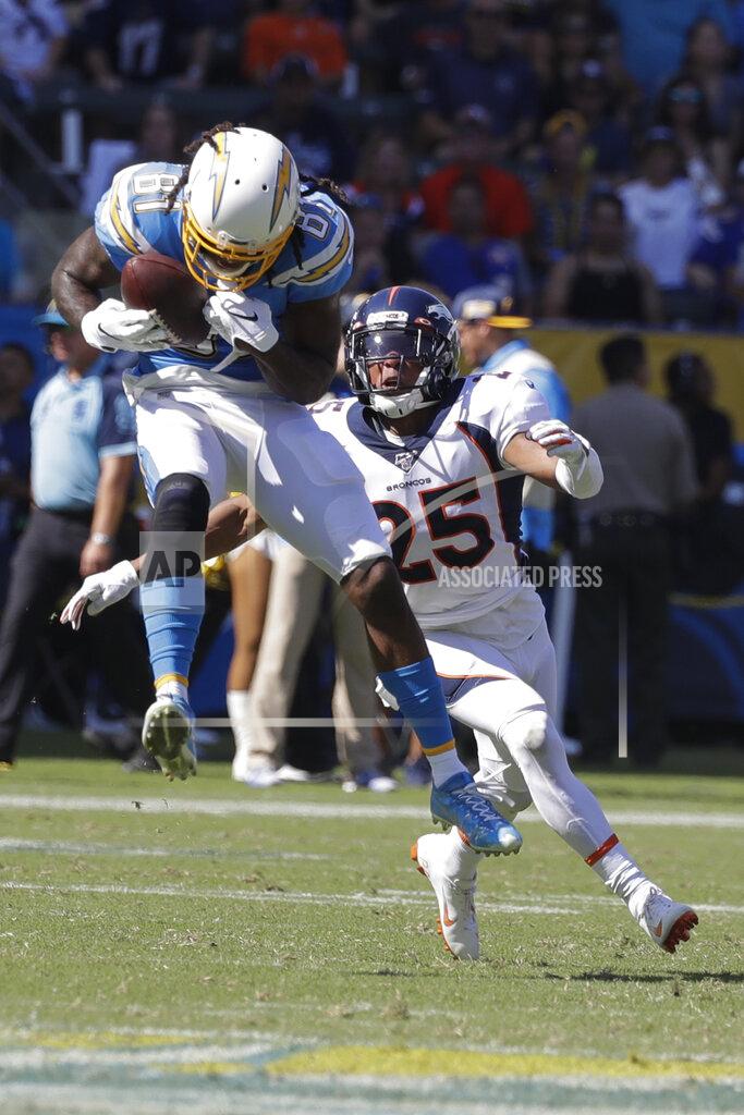 Alex Gallardo Los Angeles Chargers wide receiver Mike Williams catches a pass as Denver Broncos cornerback Chris Harris looks on during the first half of an NFL football game Sunday, Oct. 6, 2019, in Carson, Calif. (AP Photo/Alex Gallardo)