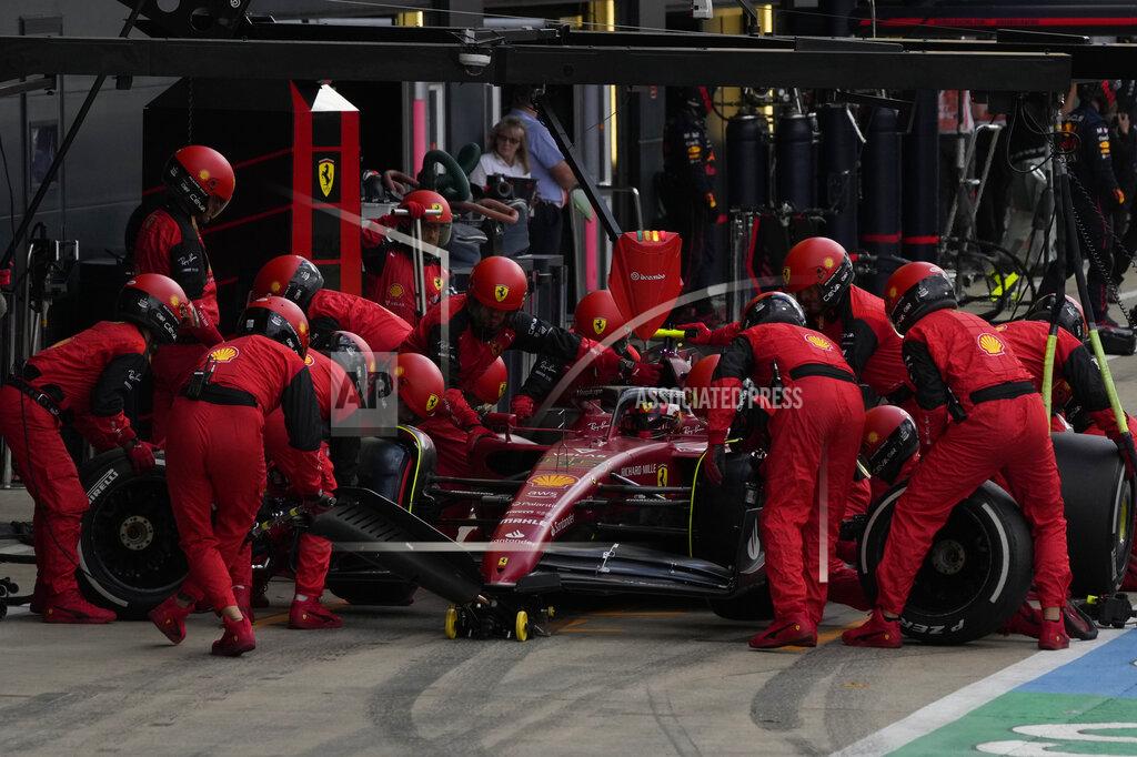 Matt Dunham Ferrari driver Carlos Sainz of Spain gets a pit service during the British Formula One Grand Prix at the Silverstone circuit, in Silverstone, England, Sunday, July 3, 2022. (AP Photo/Matt Dunham, Pool)