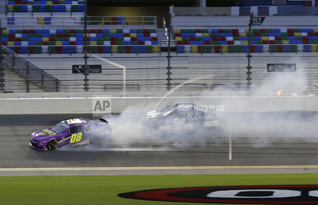 Terry Renna Joe Graf Jr. (08) spins as Caesar Bacarella (90) drives by during a NASCAR Xfinity auto race at Daytona International Speedway, Friday, Aug. 28, 2020, in Daytona Beach, Fla. (AP Photo/Terry Renna)