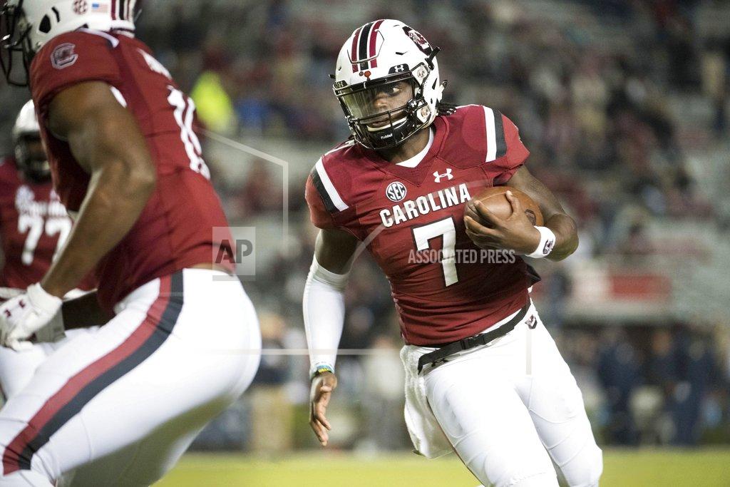 Sean Rayford South Carolina quarterback Dakereon Joyner (7) runs with the ball during the second half of an NCAA college football game against Chattanooga Saturday, Nov. 17, 2018, in Columbia, S.C. (AP Photo/Sean Rayford)