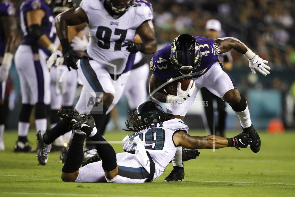 Matt Rourke Baltimore Ravens' Justice Hill (43) tries to break free of Philadelphia Eagles' Avonte Maddox (29) during the first half of a preseason NFL football game Thursday, Aug. 22, 2019, in Philadelphia. (AP Photo/Matt Rourke)