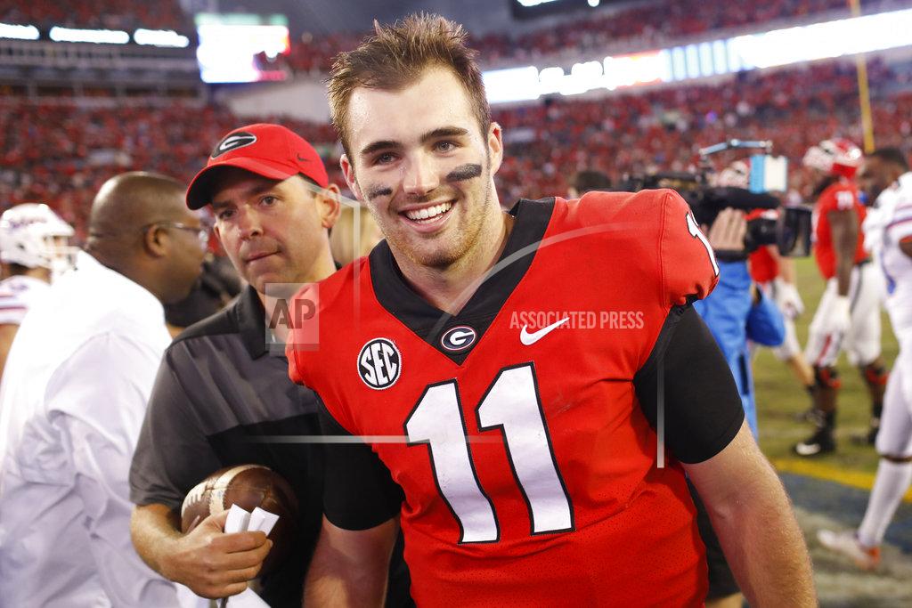 Joshua L. Jones Georgia quarterback Jake Fromm (11) heads to speak with the media after getting a win in an NCAA college football game between Georgia and Florida at in Jacksonville, Fla. Saturday, Oct. 27, 2018. (Joshua L. Jones/Athens Banner-Herald via AP)