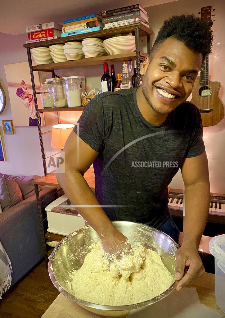 Michael Lowney Broadway performer Max Kumangai makes sourdough bread from his apartment in New York. The triple threat from the musical “Jagged Little Pill” has leaned into a fourth skill as the pandemic marches on: baking and selling his own sourdough. (Michael Lowney/Humpday Dough via AP)