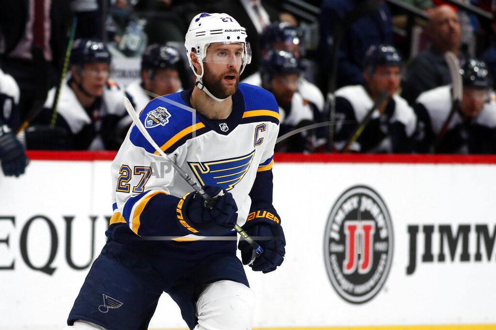 David Zalubowski FILE - In this Jan. 18, 2020, file photo, St. Louis Blues defenseman Alex Pietrangelo skates during the second period of an NHL hockey game in Denver. Pietrangelo, and many other pending free agents would have already cashed in at this point in the summer in a regular year. Instead, returning to compete in the NHL playoffs after time away represents a significant injury risk with free agency looming in October and the chance of something serious jeopardizing next season. (AP Photo/David Zalubowski, File)