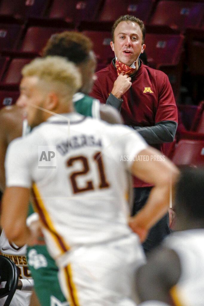 Bruce Kluckhohn Minnesota coach Richard Pitino watches the team play Green Bay Phoenix during an NCAA college basketball game Wednesday, Nov. 25, 2020, in Minneapolis. Minnesota won 99-69. (AP Photo/Bruce Kluckhohn)