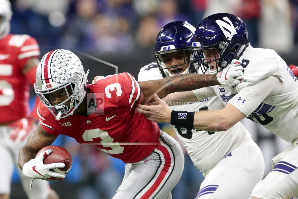 Aj Mast Ohio State cornerback Damon Arnette (3) runs with the ball after intercepting a pass by Northwestern quarterback Clayton Thorson, right, as Northwestern wide receiver Cameron Green, center, watches during the second half of the Big Ten championship NCAA college football game, Saturday, Dec. 1, 2018, in Indianapolis. (AP Photo/AJ Mast)