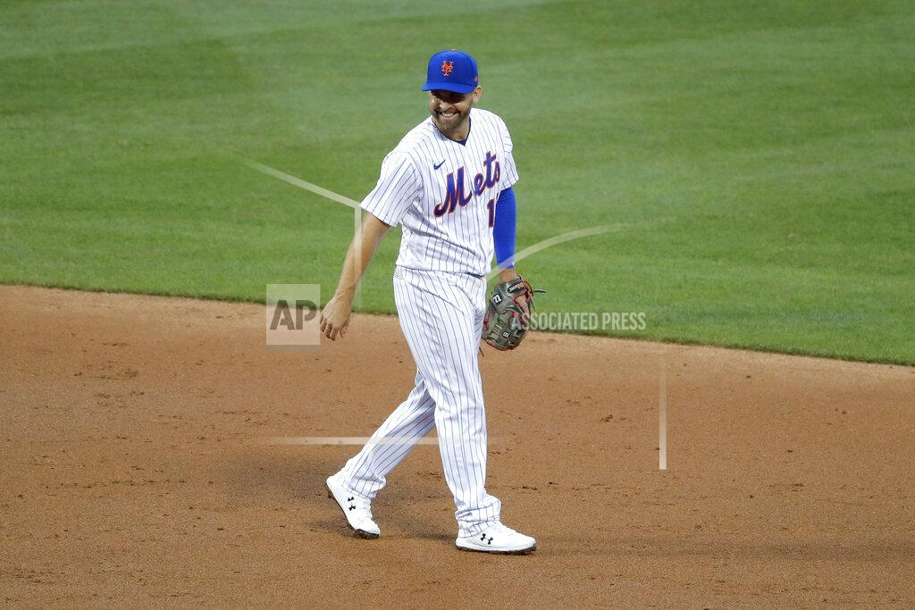 Seth Wenig New York Mets second baseman Brian Dozier smiles during the second inning of the baseball game against the Boston Red Sox at Citi Field, Thursday, July 30, 2020, in New York. (AP Photo/Seth Wenig)