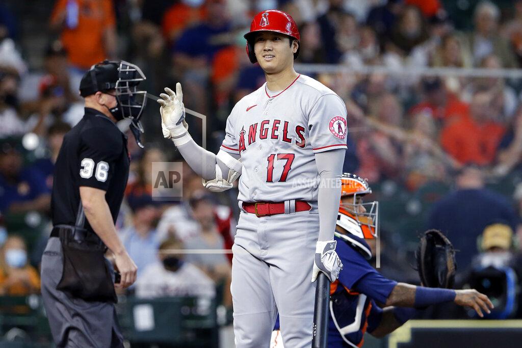 Michael Wyke Los Angeles Angels designated hitter Shohei Ohtani (17) reacts to umpire Ryan Blakney (36) after getting called out on strikes as Houston Astros catcher Martin Maldonado, right, returns the ball during the first inning of a baseball game Sunday, April 25, 2021, in Houston. (AP Photo/Michael Wyke)