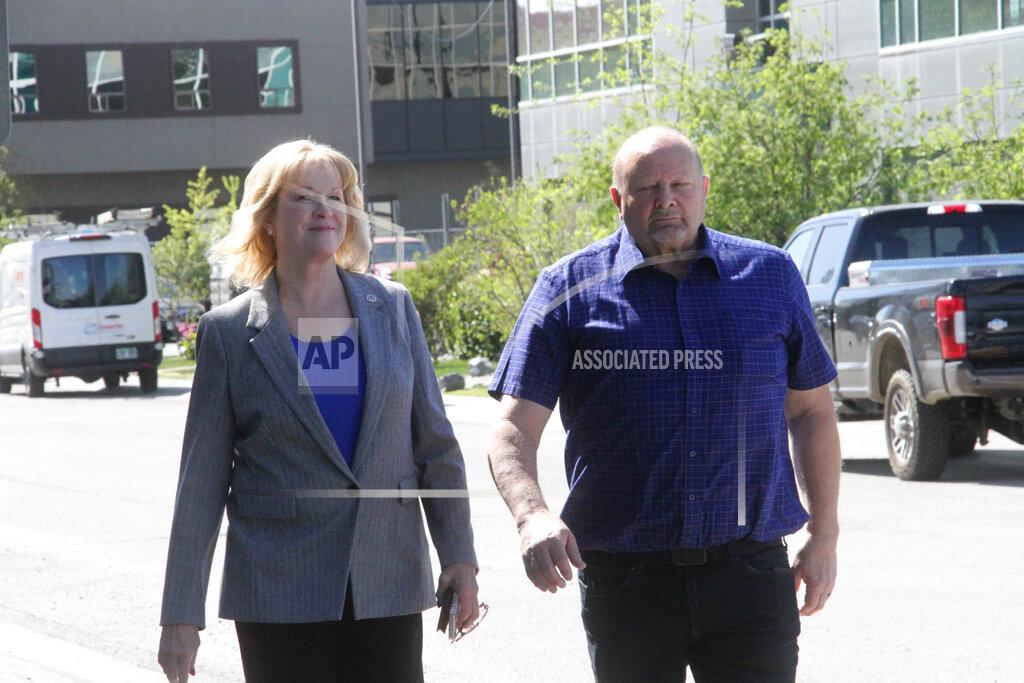 Mark Thiessen Nancy Dahlstrom, left, arrives at the Alaska Division of Elections office in Anchorage, Alaska, on Monday, May 23, 2022, with her husband, Kit Dahlstrom. Nancy Dahlstrom was chosen by Alaska Gov. Mike Dunleavy to be his running mate in the 2022 election after current Lt. Gov. Kevin Meyer did not seek re-election. (AP Photo/Mark Thiessen)