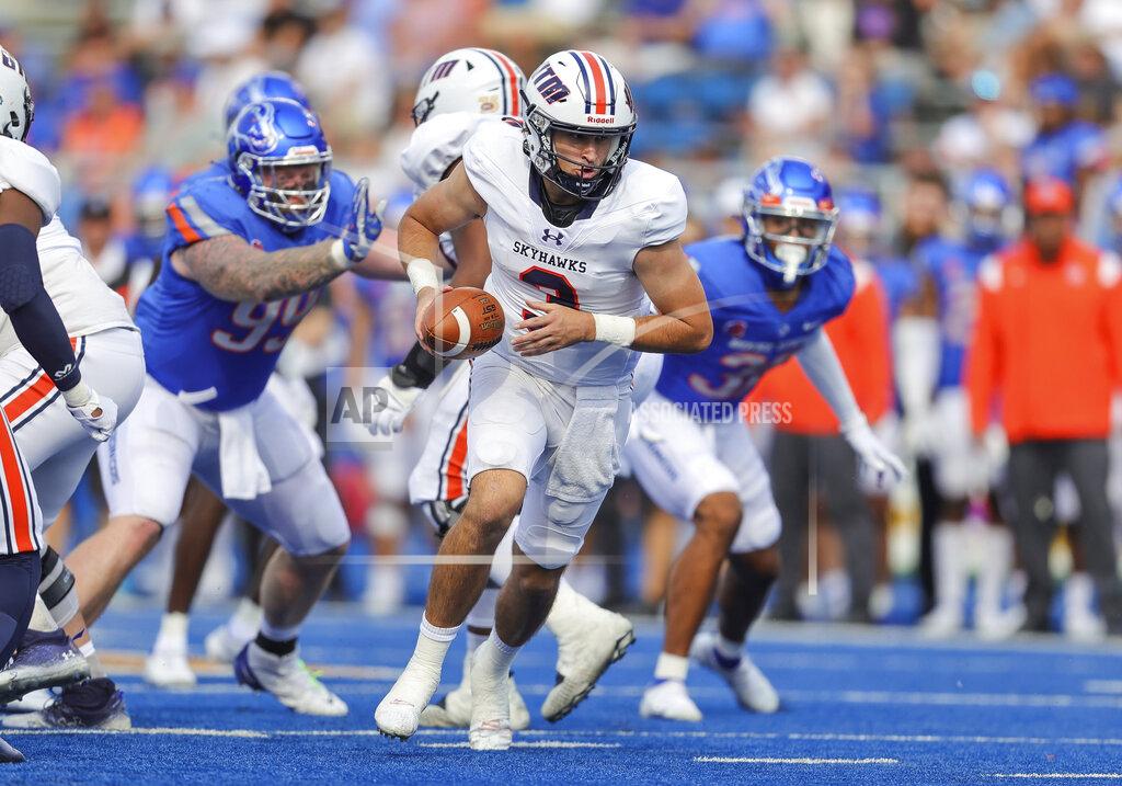 Steve Conner Tennessee-Martin quarterback Dresser Winn (3) turns to hand off the ball against Boise State in the second half of an NCAA college football game, Saturday, Sept. 17, 2022, in Boise, Idaho. (AP Photo/Steve Conner)
