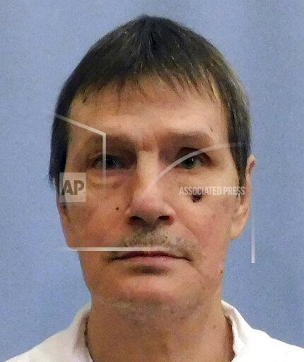 FILE - This undated photo from the Alabama Department of Corrections shows inmate Doyle Lee Hamm. The Alabama inmate whose lethal injection was halted because medical staff couldn't find a suitable vein for the execution has died of natural causes almost four years later, his lawyer said. Hamm, who was convicted in the slaying of a motel clerk in 1987, died of natural causes on death row on Sunday, Nov. 29, 2021 longtime attorney Bernard Harcourt said in an blog post. He was 64. (Alabama Department of Corrections via AP)