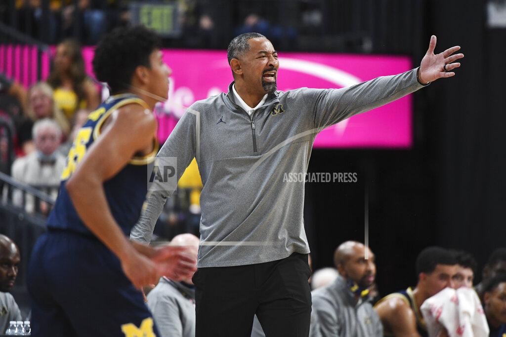 Sam Morris Michigan head coach Juwan Howard disagrees with a call during an NCAA college basketball game against Arizona Sunday, Nov. 21, 2021, in Las Vegas. (AP Photo/Sam Morris)