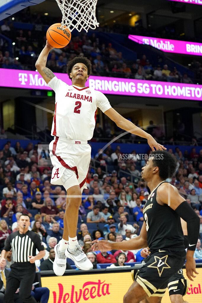 Chris O'meara Alabama forward Darius Miles (2) goes up for a dunk over Vanderbilt guard Rodney Chatman (3) during the first half of an NCAA men's college basketball Southeastern Conference tournament game Thursday, March 10, 2022, in Tampa, Fla. (AP Photo/Chris O'Meara)