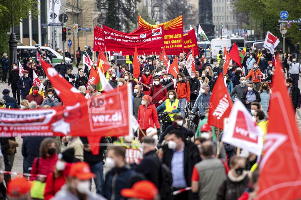 Matthias Balk Numerous participants march at a rally of the German Federation of Trade Unions (DGB) under the motto "Solidarity is the Future" in Munich, Saturday, May 1, 2021. (Matthias Balk/dpa via AP)