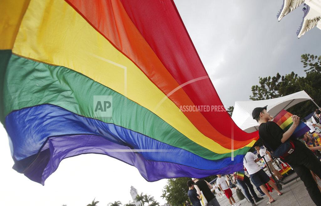 Chiang Ying-Ying Participants march during the "Taiwan Pride March for the World!" at Liberty Square at the CKS Memorial Hall in Taipei, Taiwan, Sunday, June 28, 2020. This year marks the first Gay Pride march in Chicago 1970, and due to the COVID-19 lockdown, Taiwan is one of the very few countries to host the world's only physical Gay Pride. (AP Photo/Chiang Ying-ying)