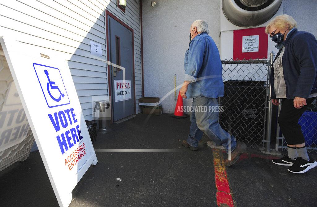 Mark Moran Voters arrive to cast their ballots for the primary election at the Dupont VFW in Dupont, Pa., on Tuesday, May 18, 2021. (Mark Moran/The Citizens' Voice via AP)