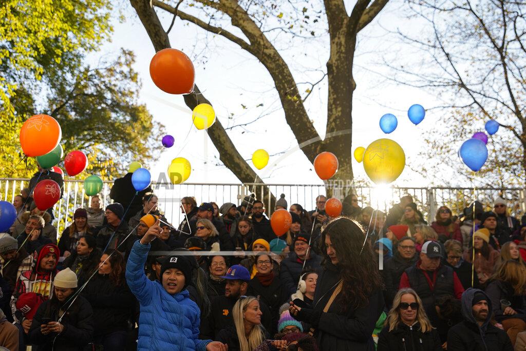 Julia Nikhinson Spectators watch from the start point of the Macy's Thanksgiving Day Parade, Thursday, Nov. 24, 2022, in New York. (AP Photo/Julia Nikhinson)