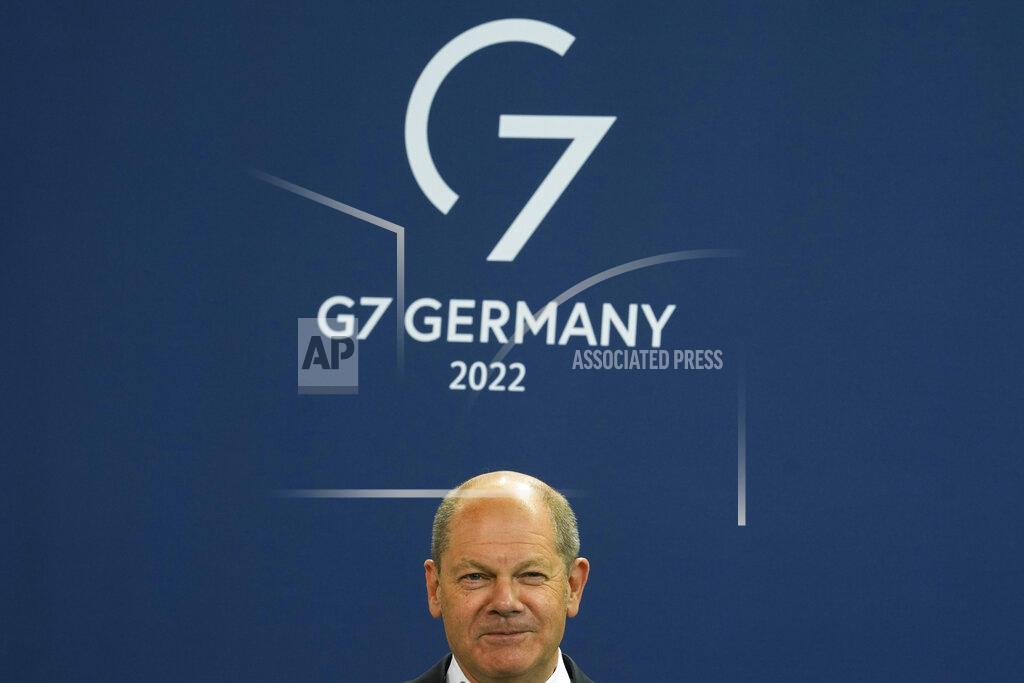 Markus Schreiber FILE - German Chancellor Olaf Scholz attends the presentation of a special stamp of the German mail service Deutsche Post for the upcoming G7 summit, at the chancellery in Berlin, Germany, Wednesday, June 15, 2022. Three back-to-back summits over the next week will test Western resolve to support Ukraine and the extent of international unity as rising geopolitical tensions and economic pain cast an increasingly long shadow. (AP Photo/Markus Schreiber, File)