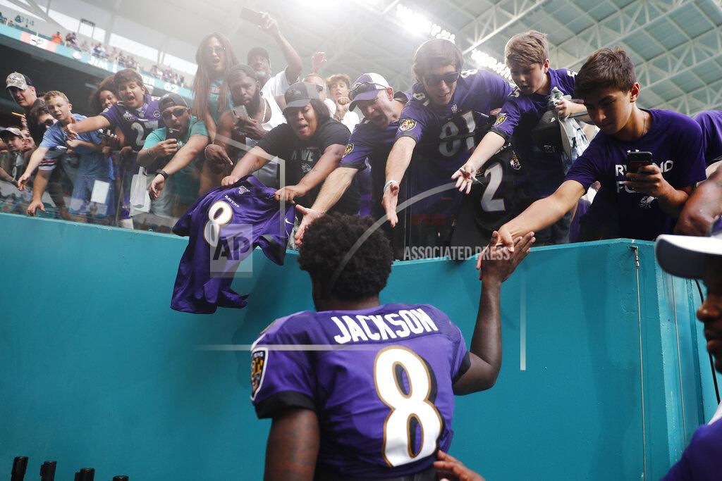 Brynn Anderson Baltimore Ravens quarterback Lamar Jackson (8) is cheered by fans as he exits the field, at the end of an NFL football game, Sunday, Sept. 8, 2019, in Miami Gardens, Fla. The Ravens defeated the Dolphins 59-10. (AP Photo/Brynn Anderson)