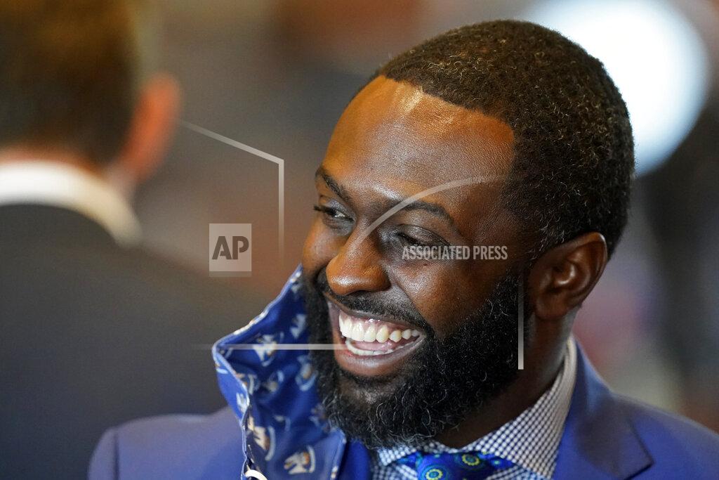 Gerald Herbert Ted James, D-Baton Rouge, charmain of the Legislative Black Caucus in Baton Rouge, talks with fellow lawmakers during opening day of the Louisiana legislative session in Baton Rouge, La., Monday, April 12, 2021. (AP Photo/Gerald Herbert)