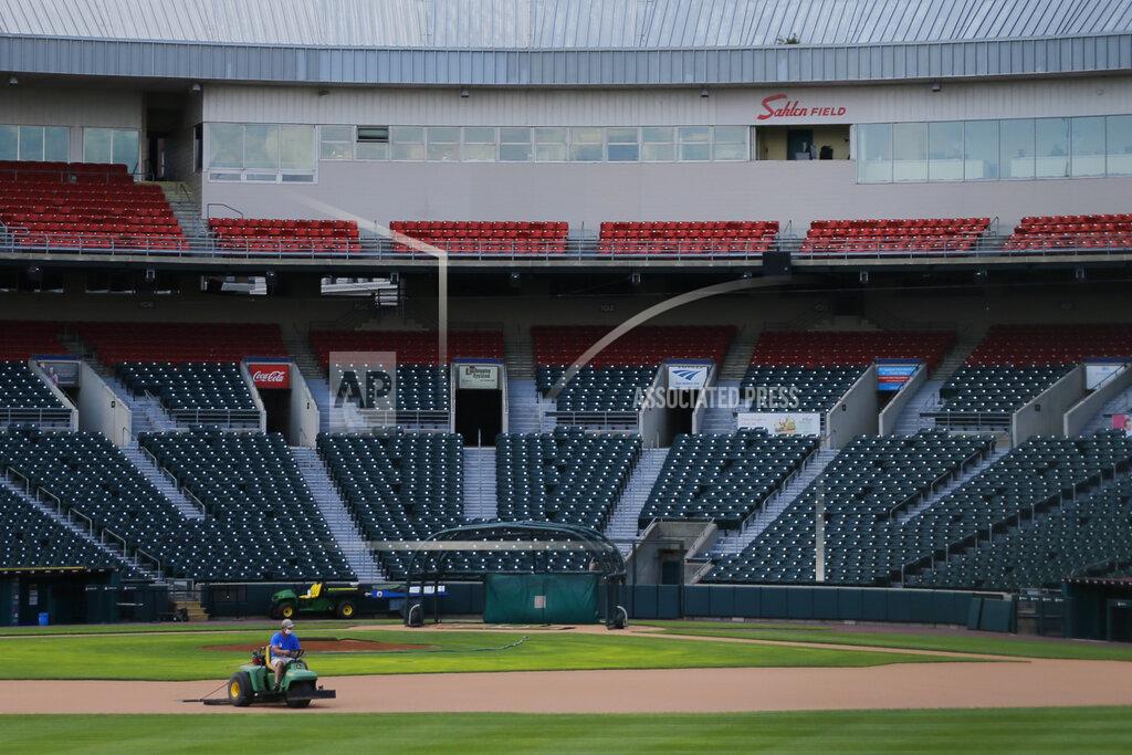 Jeffrey T. Barnes Grounds crew work on the field following the announcement that the Toronto Blue Jays will play their 2020 home games at Sahlen Field, their Triple-A affiliate, Friday, July 24, 2020, in Buffalo N.Y. (AP Photo/Jeffrey T. Barnes)