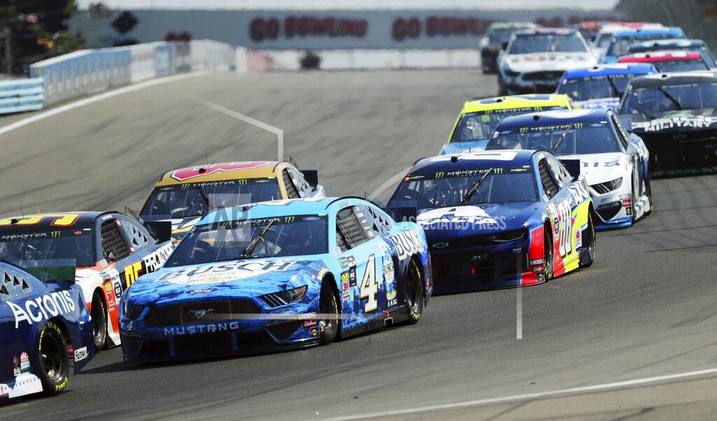John Munson Kevin Harvick (4) Alex Bowman (88) head into Turn 1 during a NASCAR Cup Series auto race at Watkins Glen International, Sunday, Aug. 4, 2019, in Watkins Glen, N.Y. (AP Photo/John Munson)
