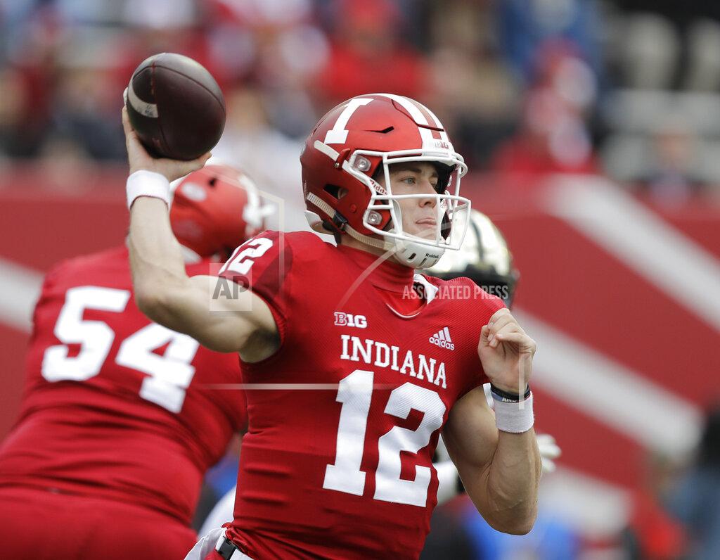 FILE - In this Nov. 24, 2018, file photo, Indiana quarterback Peyton Ramsey throws during the first half of an NCAA college football game against Purdue, in Bloomington, Ind. Ramsey learned one key lesson from the two previous quarterback competitions at Indiana: Forget the comparisons.(AP Photo/Darron Cummings, File)
