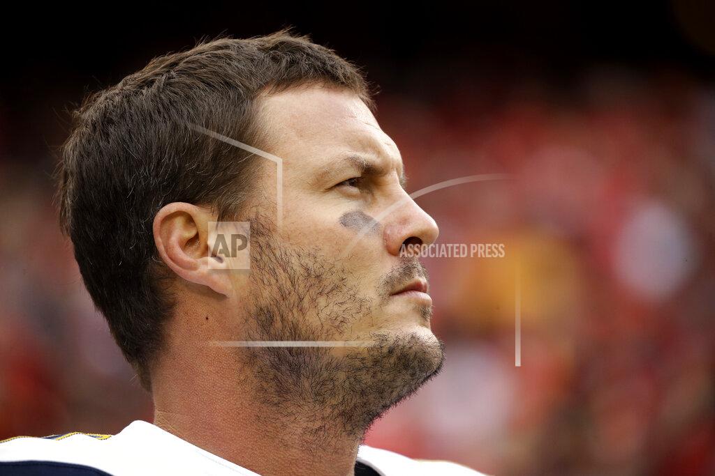 Charlie Riedel FILE - In this Dec. 29, 2019, file photo Los Angeles Chargers quarterback Philip Rivers stands for the national anthem before an NFL football game against the Kansas City Chiefs in Kansas City, Mo. Rivers' career with the Los Angeles Chargers has come to an end. The franchise announced Monday, Feb. 10, 2020, that Rivers will enter free agency and not return for the upcoming season. (AP Photo/Charlie Riedel, File)